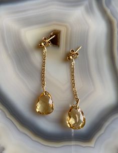 Delicate, feminine and so gorgeous! This is an 18k Gold Filled Earrings featuring a beautiful polished Citrine gemstone. You can see how clear is this stone’s cut. Amazing! Citrine is a great gem to wear to increase motivation! You will love how it will match a lot of your outfits! Product Details: . Size: 2” . Material: 18k Gold Filled Elegant Citrine Birthstone Jewelry, Elegant Citrine Jewelry With Gemstone Accents, Luxury Citrine Jewelry With Matching Earrings, Timeless Citrine Jewelry As Gift, Timeless Citrine Jewelry For Gift, Elegant Citrine Gemstones With Gemstone Accents, Yellow Gold Briolette Citrine Earrings, Elegant Citrine Gemstones For Wedding, Elegant Briolette Crystal Earrings Gift