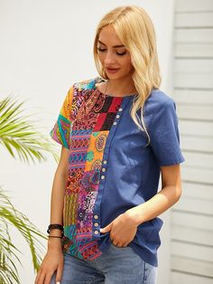 Blue Crew Neck Blouse For Summer, Blue Printed Crew Neck Blouse, Blue Relaxed Fit Short Sleeve Blouse, Blue Printed Tops With Relaxed Fit, Blue Relaxed Fit Crew Neck Short Sleeve Top, Blue Blouse With Relaxed Fit And Short Sleeves, Blue Short Sleeve Blouse With Relaxed Fit, Casual Multicolor Patchwork T-shirt, Casual Blue Blouse With Patchwork