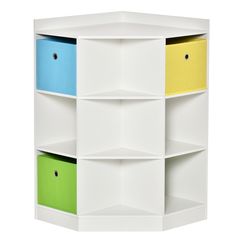 a white shelf with four different colored drawers