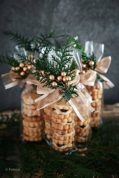 some crackers are wrapped in clear cellophane and tied together with ribbon to hold them