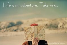 a person holding up a map with the words life is an adventure take riskys