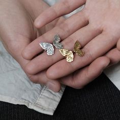 Why We Made This Adorn your fingers with the timeless beauty of our Adjustable Butterfly Ring, meticulously crafted in sterling silver and available in both silver and gold finishes. This exquisite piece of jewelry seamlessly combines elegance with versatility, making it a perfect accessory for any occasion. Designed to fit most finger sizes, providing comfort and flexibility. The ring features a stunning butterfly motif, delicately etched for a captivating and enchanting look. Product Details M Fine Jewelry Sterling Silver Tarnish Resistant Stackable Rings, Fine Jewelry Sterling Silver Stackable Rings Tarnish Resistant, Tarnish Resistant Sterling Silver Stackable Rings, Elegant Nickel-free Stackable Rings For Anniversary, Elegant Nickel Free Midi Rings For Anniversary, Elegant Nickel-free Midi Rings For Anniversary, Elegant Sterling Silver Butterfly Jewelry, Elegant Silver Nickel-free Stackable Rings, Elegant Hypoallergenic Butterfly Jewelry