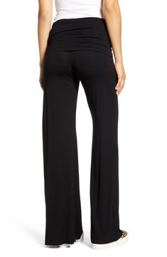 Flowy knit pants are wonderfully soft and versatile with a wide fold-over waistband that can be worn over or under your growing bump. 34 1/2" inseam; 29" leg opening (size Medium) 96% rayon, 4% spandex Hand wash, dry flat Made in the USA Versatile Yoga Pants For Lounging, Versatile Full-length Yoga Pants For Lounging, Relaxed Fit Yoga Pants With Wide Waistband For Loungewear, Versatile Stretch Pants For Lounging, Versatile Stretch Modal Bottoms, Versatile Loungewear Yoga Pants With Wide Waistband, Chic Stretch Modal Bottoms, Versatile Yoga Pants With Wide Waistband For Loungewear, Bump Friendly Black Pants