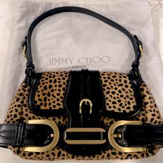 Like New Sexy Black Leather,Leopard Print Soft Pony Hair With Brushed Gold Hardware. Inside Suede Is Pristine Includes Dust Bag Jimmy Choo Bag, Pony Hair, Black And Tan, Jimmy Choo, Leopard Print, Dust Bag, Black Leather, Bag Lady, Handbags