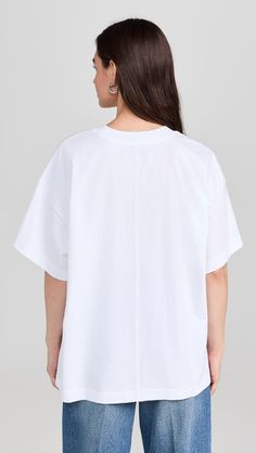 La Ligne Solid Super Oversize Short Sleeve Tee | Shopbop Oversized Casual T-shirt For Daywear, Relaxed Fit Short Sleeve T-shirt For Daywear, Spring Boxy Workwear Tops, Spring Boxy Tops For Workwear, Oversized T-shirt For Spring Workwear, Spring Top With Boxy Fit And Shirttail Hem, Spring Boxy Fit Tops With Shirttail Hem, Boxy Cotton Short Sleeve Crew Neck Top, Summer Cotton T-shirt With Batwing Sleeves