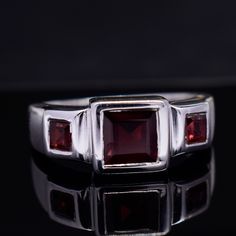 Large Garnet Ring, Handmade Red Garnet Ring, Gemstone Jewelry, 925 Sterling Silver & 18k Gold Fill, Faceted Square Ring, Signet Garnet Ring Description :- Metal :- 925 Sterling Silver/ 18k Gold Filled  Gemstone :- Natural Red Garnet  Stone Shape :- Square Stone Color :- Red   Handmade Items **Made to Order** Delivery Time:- Once Item is shipped parcel will be delivered to you in 2-4 weeks. C U S T O M I Z E O R D E R  All jewelry are made with solid 925 sterling silver. If you want to make any changes in this jewelry, then please send us a message. We accept custom orders also. All jewelry are nickle free. Visit our shop : https://www.etsy.com/in-en/shop/MiharSilverCrafts Formal Garnet Burgundy Ring, Formal Burgundy Garnet Ring, Formal Red Birthstone Ring With Polished Finish, Formal Red Polished Birthstone Ring, Formal Ruby Three-stone Rings, Classic Red Gemstone Crystal Ring, Formal Red Ruby Ring With Three Stones, Formal Ruby Three Stone Ring, Classic Red Three Stone Rings