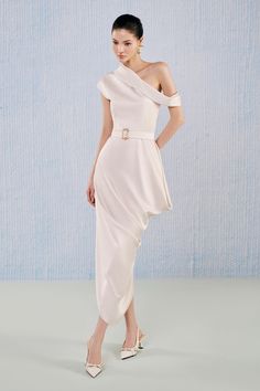 Crafted from a luxurious silk blend, its unique diagonal neckline and ankle length design will make a statement at any event. Be the epitome of sophistication and elegance in this exclusive dress. Elegant Midi Dress With Asymmetrical Hem For Formal Occasions, Elegant Satin Maxi Dress With Asymmetrical Neckline, Elegant Formal Midi Dress With Asymmetrical Hem, Chic Asymmetrical Neckline Maxi Dress For Wedding, Chic Fitted One-shoulder Dress For Banquet, Chic Fitted One Shoulder Dress For Banquet, Elegant Draped Satin One Shoulder Dress, Luxury Asymmetrical Neckline Cocktail Dress, Chic Evening Dress With Asymmetrical Neckline For Wedding