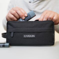 Made for those always on the move, our new Cardon Dopp Kit is the perfect toiletry bag to take your skincare with you wherever you go. It's sleek, portable, and extremely spacious design allows you to pack a ton while staying compact. The dopp kit one main pouch and one zippered front pocket to store smaller essentials, like your razor, tooth brush and nail clippers. Functional Portable Cosmetic Bag, Functional Portable Cosmetic Bag For On-the-go, Portable Functional Cosmetic Storage For On-the-go, Man Purse, Dopp Kit, Toiletry Bag, Brushing Teeth, Zipper, Pouch