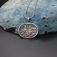 Besmele Engraved Silver Necklace, Islamic Silver Necklace, 925 Sterling Silver Necklace, Arabic Calligraphy Necklace ✦ Details ✦ * Material: 925 Sterling Silver * Weight of pendant :7,70  gram. * Chain Weight :             20 Inches = 5.00 Gr             22 Inches = 5.60 Gr             24 Inches = 6.05 Gr             26 Inches = 6.70 Gr             28 Inches = 7.10 Gr * Sides oxidized * Stamp: 925 ✦ Shipping ✦ * Processing time: 1-3 business days. * This item ships from my Turkish workshop in Is Etched Sterling Silver Necklace Gift, Spiritual Sterling Silver Necklace With Engraving, Sterling Silver Etched Necklace For Gift, Etched Sterling Silver Necklace For Gift, Traditional Engraved Oval Necklace, Sterling Silver Oval Pendant Necklace, Silver Etched Pendant Necklace, Engraved White Gold Pendant Necklace, Engraved Oval Pendant Necklace As Gift