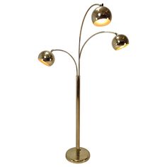 three light floor lamp in brass finish