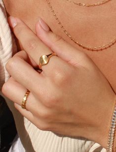 Details: Make a statement with our Coco Ring! Made with gold plated stainless steel, this ring is perfect for everyday wear. You can confidently stack your rings without worrying about any tarnishing. Our Coco Ring is also skin friendly and waterproof, so you can wear it all day and even to the beach! It's a great addition to your jewelry collection and adds a touch of elegance to any outfit. * Gold Plated Stainless Steel (PVD Plating) * Size Options: US 6 - 8 ►WATER-SAFE: Our jewelry uses a spe Dainty Gold Signet Ring For Everyday, Dainty Gold Engraved Ring For Everyday, Adjustable Gold Initial Ring For Everyday, Gold Dainty Engraved Ring Tarnish Resistant, Dainty Gold Engraved Tarnish-resistant Ring, Dainty Gold Engraved Ring Tarnish Resistant, Gold Stainless Steel Rings For Anniversary, Gold Dainty Initial Ring With Polished Finish, Everyday Gold Tarnish-resistant Signet Ring