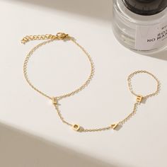 Durable and stylish, our waterproof bracelet is crafted for both functionality and fashion. Perfect for any occasion, it's the ideal accessory for those who appreciate durability and timeless elegance. Perfect for the minimalist and a beautiful piece to layer with. A true versatile statement piece that you can wear straight from the pool to dinner! - 18K gold plated / stainless steel - Waterproof technology Minimalist Metal Bracelets For Gifts, Minimalist Metal Bracelets As Gift, Minimalist Metal Bracelet For Gift, Minimalist Stainless Steel Bracelet Strap Jewelry, Minimalist Stainless Steel Jewelry With Bracelet Strap, Minimalist Stainless Steel Bracelet Jewelry, Adjustable Simple Bracelet Jewelry, Adjustable Simple Bangle Jewelry, Modern Friendship Bracelet Jewelry