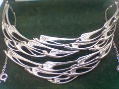 "A rare vintage Scottish sterling silver \"flight of swallows\" collar necklace inspired by Peter Wylie Davidson. This is a fantastic piece of collectable jewellery that is very sort after and will only increase in value. perfect condition with original box. Fully hallmarked for Edinburgh, CA, 1977. The necklace is very wide measureing 5.1cm across the widest point and sits beautifully on the collar bones. the chains either size of the swallows are a total of 24cm + 14cm measureing across the top of the swallows. Please ask if you wish to see pics of the measurements!" Fine Chain Necklace, Spoon Necklace, Vintage Jewellery Rings, Diamond Tiara, Soldering Jewelry, Collar Jewelry, Jewelry Business, Jewelry Inspo, Star Necklace