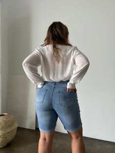 Comfortable and modest, the Plus Size Cuffed Bermuda Denim Shorts are easy to throw on with a t-shirt or blouse for a casual outfit. Grab your favorite sneakers and a cute tote and you'll be ready to head to the beach or run some errands. These shorts feature cuffed bottom hems that are sewn in place, five functional pockets and 5 belt loops, a zipper fly, and a single button closure. The material is a very stretchy denim. These shorts are made from 88% cotton, 8% polyester, and 4% spandex. Mach Bermuda Denim Shorts, Curvy Shorts, Casual Outfit, Denim Shorts, The Beach, Casual Outfits, Light Blue, Cuff, Spandex