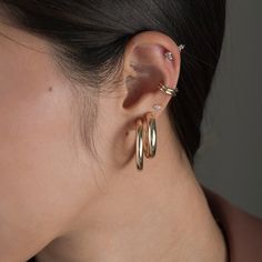 The Essential Statement Hoop - crafted to be shiny, beautiful and lightweight so they don't pull the earlobes. Available in 14k yellow gold 4mm width 1"(2.9g), 1.25"(3.4g) 1.75"(4.0g) diameter Hollow Hoop Sold as a pair Gift wrapping available Modern Yellow Gold Hoop Cartilage Earrings, Minimalist 14k Gold Hoop Earrings With Shiny Finish, Classic 14k Gold Hoop Cartilage Earrings, Fine Jewelry Polished Hoop Earrings For Everyday, Polished Fine Jewelry Hoop Earrings For Everyday, Classic Hoop Cartilage Earrings, Everyday Fine Jewelry Hoop Earrings With Polished Finish, Everyday Polished Hoop Earrings In Fine Jewelry Style, Classic Small Hoop Huggie Earrings With Halo