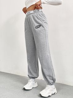 F00215614-103 Sports Joggers With Elastic Waist And Tapered Leg, Baggy Solid Color Sports Pants, Sporty Straight Leg Bottoms With Ribbed Waistband, Wide Leg Sportswear Joggers, Sportswear Pants With Pockets And Straight Leg, Sporty Straight Leg Joggers With Ribbed Waistband, Sportswear Relaxed Fit Full Length Bottoms, Sportswear Pants With Pockets Full Length, Sportswear Bottoms With Relaxed Fit