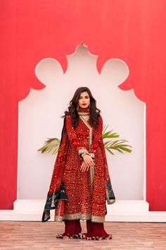 Elevate your style with our Red Chiffon Chunri Shalwar Kameez. This angharka-style suit features intricate embroidery on the bodice, neckline, daman, and sleeves, adding a touch of elegance. The golden kamdani chan work on the dupatta and kameez adds a shimmering allure. Complete the look with a matching red chunri dupatta and crushed shamoz silk sharara. 3-piece suit Ready-to-wear Angharka Style, Silk Sharara, Red Chiffon, Shalwar Kameez, Intricate Embroidery, 3 Piece Suits, Wedding Men, Winter Women, The Golden