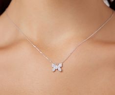 14K SOLID WHITE GOLD BUTTERFLY NECKLACE WITH DIAMONDS Metal : 14K Solid Gold Necklace Length : 16 inches / 40cm Butterfly Height : 10mm Butterfly Width : 10.75mm Diamond : 35 Diamonds --- Nice White Color Sparkle Diamonds ---- G-H color SI2 clarity Total Carat: 0.18ct ---MADE IN USA--- ---This is a beautiful 14K Solid White Gold Butterfly Necklace with Diamonds. Available White Gold -Yellow Gold or Rose Gold ---Absolutely stunning. Comes in a gift box. ---Shipping Policy---- Item will be shipped White Diamond Necklace With Butterfly Charm, White Gold Butterfly Pendant Necklace For Anniversary, Formal White Gold Necklace With Butterfly Charm, Anniversary White Gold Butterfly Pendant Necklace, Fine Jewelry Butterfly Necklaces In White Gold, Butterfly Shaped Fine Jewelry Necklace For Anniversary, Fine Jewelry Butterfly Necklace For Anniversary, Sterling Silver Butterfly Necklace For Wedding, Fine Jewelry White Necklace With Butterfly Charm