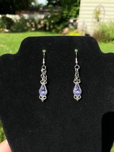 Beautiful authentic amethyst gemstone earrings. Unique vintage style of plating around the gems. Looks gorgeous in the sunlight! Purple Metal Drop Earrings, Vintage Amethyst Purple Earrings, Handmade Purple Metal Earrings, Purple Metal Dangle Earrings, Purple Dangle Metal Earrings, Nickel Free Purple Crystal Drop Earrings, Purple Drop Crystal Earrings Nickel Free, Purple Teardrop Metal Earrings, Purple Amethyst Jewelry For Pierced Ears