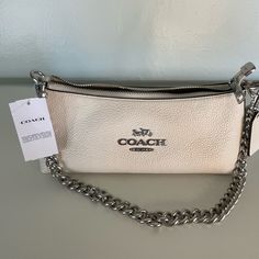 Silver/Chalk. 100% Authentic With Tags Included. Straight From Woodbury Common Premium Outlets. Dm If Any Questions. Coach Charlotte Bag, Modern Cream Shoulder Bag With Branded Hardware, Chic Cream Coach Shoulder Bag, Everyday Cream Bags With Silver-tone Hardware, Chic Cream Coach Bag, Coach Cream Pouch Shoulder Bag, Cream Bags With Silver-tone Hardware For Daily Use, Coach Cream Evening Bag, Classic White Pouch Shoulder Bag