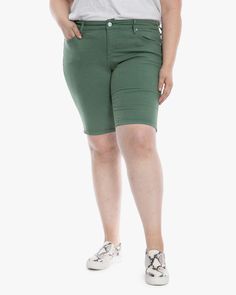 These super soft and chic denim Bermuda shorts are done in a pretty summery green and have five pockets. Try them with a tee or peasant blouse and mules. These plus-size shorts are ready for summery weather, comfy tees, and flirty cutout tops. Slink Jeans Haley Mid rise Bermuda | Light Green | Jeans | Materials & Care Instructions: ['58% Cotton, 39% Rayon, 3% Spandex', 'Machine wash cold', 'Imported'] Trendy Green Stretch Jean Shorts, Casual Knee-length Jean Shorts For Summer, Knee-length Cotton Jean Shorts For Spring, Trendy Mid-thigh Jean Shorts For Spring, Trendy Mid-thigh Length Jean Shorts For Spring, Green Stretch Jean Shorts, Casual Green Bermuda Shorts, Casual Mid-thigh Length Jean Shorts For Spring, Spring Green Bermuda Shorts With Built-in Shorts