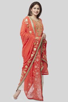 Show off your elegant style with this Set from Riafashions. Coral...the warm glow of this color compliments the radiant you for festive season. Set Features: Kurta Fabric: Chanderi Pants - Chanderi Cotton Dupatta: Net Dupatta Work: Gotta and Hot Pink Work Perfect to pick for Party, Wedding, Festival. Free Stitching & Shipping in the USA Leheriya Dupatta, Free Stitching, Silk Kurti, Peachy Orange, Yellow Pants, Cotton Dupatta, Beautiful Suit, Net Dupatta, Silk Pants