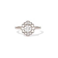 Item Details: One natural round brilliant cut center diamond approx 0.50 ctw, F color VS clarity. Sixteen natural baguette, princes, and round brilliant cut diamonds approx 0.36 ctw, F color VS clarity. The mosaic on this ring is 10.75x10.25mm, and the band is 1.65mm wide. This ring can be made in two styles. "In line" which means the mosaic portion of the ring sits flush with the finger, and "Raised" which means the mosaic portion is elevated slightly leaving room for a wedding band to nest wit Berlinger Jewelry, Wide Engagement Ring, Mosaic Ring, Art Deco Diamond Ring Engagement, Mens Diamond Band, Wedding Ring Styles, Leaving Room, Wedding Day Jewelry, Diamond Mosaic