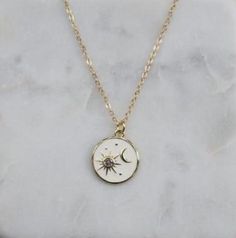 Sun and Moon necklace -Length: 18" + 2" extender. Lengthens up to 20" -Charm measurements: 15mm x 15mm  -Chain: 1.3mm flat cable chain -Finish: 14k gold filled. Tarnish resistant and water resistant. The sun shall be no more your light by day, nor for brightness shall the moon give you light; but the Lord will be your everlasting light, and your God will be your glory. -Isaiah 60:19 Sun Moon Necklace, Sun And Moon Necklace, Christian Necklace, Sun And Moon, Moon Necklace, Sun Moon, Necklace Length, Cable Chain, Necklace Pendant