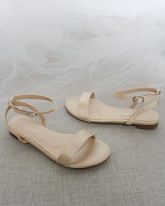 Classy satin flat sandals with ankle strap. Effortless yet adorable to wear on your favorite occasion. Can be pair with dress or casual look.DETAILS:COLORS AVAILABLE: Ivory, White, Pink, Light Blue, and ChampagneUPPER: Synthetic upper and liningMATERIALS: Mandmade outsoleSTYLE NAME: MADDY Champagne Shoes Wedding, Prom Flats, Bridesmaid Shoes Flat, Flat Prom Shoes, Bridesmaid Flats, Bridesmaid Sandals, Cream Flats, Nude Flats, Girls Flats