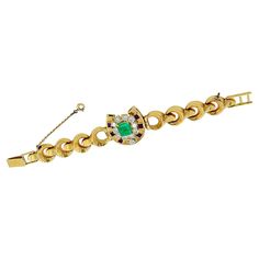 This stunning French vintage bracelet made approximately in the 1980s, is the perfect blend of timeless elegance and exquisite design. Crafted from 18k yellow gold, it features a captivating square-cut emerald at its center, surrounded by 11 round diamonds with a total carat weight of approximately 3.85 carats, and six amethysts that add a beautiful pop of color. The diamonds are estimated as H-I color, VS-SI clarity. The emerald is of a very good quality, with a vibrant green color and a high level of brilliance. The origin is estimated as Zambian. The diamonds are perfectly cut to maximize their sparkle and fire, and the amethysts add a rich, deep purple hue to the overall design. The prong settings of the diamonds allow light to enter from all angles, creating a brilliant and eye-catchi Style Français, Vintage Bracelet, Square Cut, Purple Hues, The 1980s, Vibrant Green, Vintage Bracelets, Exquisite Design, Deep Purple