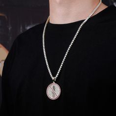 This beautiful piece is crafted from high quality gold plated material and features a sleek, elegant design. The Travis Scott logo hangs from a delicate chain, making this necklace the perfect way to show your love for one of today's hottest rappers. Whether you're a diehard fan or simply appreciate great style, this necklace is sure to turn heads. So don't wait any longer - grab yours today! PRODUCT DETAILS: Metals Type: Copper Gender: Unisex Necklace Type: Pendant Necklaces Style: Hiphop/Rock Streetwear Necklaces With Cuban Link Box Chain, Streetwear Necklaces With Box Chain And Cuban Link, Cuban Link Box Chain Necklace For Streetwear, Gold Rope Chain Jewelry For Streetwear, Metal Cuban Link Necklace For Streetwear, Gold Rope Chain Jewelry, Gold Cuban Link Jewelry For Streetwear, Silver Figaro Chain Necklace For Streetwear, Silver Figaro Chain Jewelry With Round Pendant