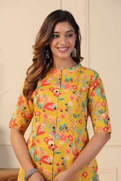 This mustard Floral Print A-line Kurta Set exhibits button down placket with coconut buttons details, sleeves has cuff and tab button along with Mandarin Collar & 3/4th Sleeves. Tailored from Cotton blend . Product Length: 45 Inches. Description  Size - Measuring Unit  : Regular Size                                 :  ( S, M, L, XL, XXL )  Ideal For                         :    Women Sales Package               :     1 Kurta::1 Palazzo Sleeve Length               :      3/4 Sleeve Pattern Mustard Color Straight Kurta Set, Mustard Straight Kurta Sets, Yellow Floral Print Kurta For Diwali, Yellow Printed Kurta For Spring, Yellow Floral Print Kurta For Festive Occasions, Festive Yellow Kurta With Floral Print, Yellow Floral Print Sets For Navratri, Festive Yellow Printed Kurta, Yellow Kalamkari Print Kurta For Festive Season