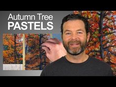 a man is standing in front of an autumn tree pastels painting with the words, autumn tree pastels