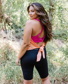 The Peach Tie Back Halter Top has an open back to show off your favorite sports bra! AND, it's so breathable and lightweight, it just might be your new workout top! Summer T-back Halter Top For Gym, Sporty Stretch T-back Halter Top, Sleeveless Halter Top With Built-in Bra For Workout, Athleisure Top With Built-in Bra And Halter Neck, Sporty T-back Halter Top For Gym, Spring Yoga Halter Top With Built-in Bra, Sporty T-back Halter Top For Sports, Summer Gym Crop Top With Strappy Back, Summer 4-way Stretch Racerback Sports Bra