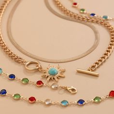 This stunning Regina Layered Lariat Necklace Set brings a playful yet elegant touch to any ensemble. Featuring a multi-color beaded design, this layered necklace set is perfect for adding a splash of color to your outfits. The lariat drop design adds a chic and sophisticated look, making it ideal for both casual wear and special occasions. The set includes two necklaces, each offering a different length for an effortlessly layered appearance. Details: Material: Gold-plated brass with colorful beads Set weight: 42.4g (1.49oz) Short necklace length: 37cm + 7cm extension (14.5in + 2.7in) Long necklace length: 70cm (27.5in) Pendant size: 2.5cm x 0.98in Chain thickness: 0.6cm (0.23in) Eye-catching multi-color bead accents Layered lariat drop design for a trendy and unique look Missy Jewelry Nec Colorful Jewelry With Adjustable Chain, Elegant Multicolor Lariat Jewelry, Multicolor Lariat Necklace With Adjustable Chain, Adjustable Multicolor Metal Chain Necklace, Multicolor Chain Choker Jewelry, Elegant Multicolor Metal Beaded Necklaces, Multicolor Metal Charm Necklace With Adjustable Chain, Multicolor Long Metal Chain Necklace, Elegant Multicolor Metal Chain Necklace