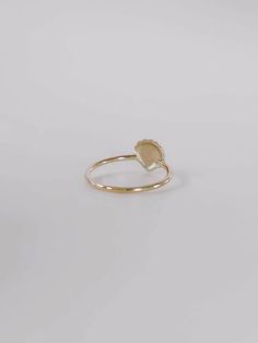 Inspired by Venus, the goddess of love, to celebrate love and relationships. First handcrafted from wax and then cast in gold, this ring's design echoes the delicate curves of a seashell, capturing the essence of Venus’s oceanic origins. Each piece honors the beauty and harmony of nature, making it a perfect symbol of romance and new beginnings. A must-have for your jewelry collection. Shell measures approximately 8 mm. Band thickness is 1.3 mm. Shiny finish or matte finish. Made with 10K solid yellow or white gold. Dainty 14k Gold Jewelry For Proposal, Yellow Gold Ring Jewelry For Proposal, Yellow Gold Proposal Ring Jewelry, Delicate Yellow Gold Jewelry For Proposal, 14k Gold Pearl Ring For Promise, 14k Rose Gold Jewelry For Proposal, 14k Gold Pearl Promise Ring, 14k Gold Oval Heart Ring For Wedding, Recycled Gold Rings With Rose Cut Diamonds For Promise