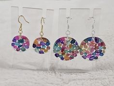 These handmade resin earrings are filled with multicolour sea shell stones. They are light and colourful. There are 2 sizes, 2cms and 3cms. You can also choose between gold and silver earring hooks. They are hypoallergenic and safe for sensitive ears. Rainbow Colorful Earrings For Gift, Colorful Round Earrings Gift, Multicolor Round Resin Earrings, Colorful Round Earrings For Gift, Hypoallergenic Rainbow Round Earrings, Handmade Multicolor Resin Earrings, Nickel-free Round Resin Earrings, Multicolor Resin Earrings For Pierced Ears, Multicolor Resin Earrings