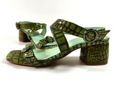 Handmade pistachio green croco leather sandals in chunky low heel. Modern strappy design with square toe and adjustable straps, that embrace and flatters all feet types! Their low block heel and their very soft insole offer true comfort. Genuine leather on the upper and inner parts, soft leather lining and antislip elastic rubber sole. High quality shoes, guaranteed to last for a long long time! PRODUCT INFO Color: green Upper material: 100% leather Linning: 100% leather Heel: leather wrapped He Green Sandals With Sculpted Heel, Green Sandals With Sculpted Open Heel, Green Open Toe Sandals With Sculpted Heel, Green Heels With Deep Heel Cup For Summer, Green Sandals With Sculpted Block Heel, Trendy Green Block Heel Sandals, Green Leather Sandals With Sculpted Heel, Green Heels With Deep Heel Cup And Block Heel, Green Block Heels With Sculpted Heel