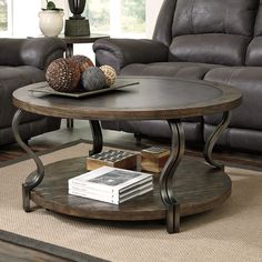 a living room with a brown couch and table