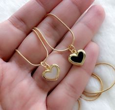 Gold filled black heart necklace MATERIAL AND SIZE Enamel black or white heart pendant 18k Gold filled chain Length: 18 inches  If you have questions about the product, feel free to reach me out. Don't forget to check out my other items in the store: Https://www.etsy.com/shop/nyahwithlove Less Trendy Black Personalized Necklace, Trendy Personalized Black Necklace, Heart Pendant Jewelry For Best Friend Gift, Trendy Black Charm Necklace For Gifts, Trendy Black Charm Necklaces For Gifts, Black Clavicle Chain Necklace As Gift, Black Necklace With Adjustable Chain For Valentine's Day, Trendy Black Heart Necklace With Clavicle Chain, Trendy Black Jewelry For Gifts