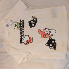 Nwt Hello Kitty With Friends T-Shirt Size 2t Cute Graphic Print Tops For Playtime, Cute White Top With Character Print, Cute White Tops With Character Print, Cute White Character Print Tops, White Tops With Character Print For Playtime, White Character Print Tops For Playtime, Hello Kitty With Friends, Fun Cotton Tops With Hello Kitty, Cute White Tops With Cat Design