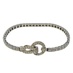 Simon G 18K White Gold Diamond Buckle 7.5" Bracelet (includes appraisal, Value: $11,000) Designer = Simon G Material = 18K Gold Gemstone = Diamond Condition = Good Class = Premier Location: Wilmette Item Number: 16904-99 Item ID: 297774 Category: Bracelet Designer Brilliant Cut Diamond Bracelet, Designer Diamond Bracelet With Brilliant Cut, Designer Bracelets With Brilliant Cut Diamonds, Formal Hallmarked Diamond Bangle Bracelet, Designer White Gold Bracelet With Brilliant Cut, Diamond Bracelet For Evening, Designer White Gold Bracelets With Single Cut Diamonds, Designer White Gold Bracelets With Brilliant Cut, Luxury Tennis Bracelet With Diamond Accents For Formal