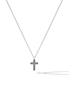 The cross itself features clean, sharp lines and a minimalist aesthetic, making it a versatile accessory that can be dressed up or down to suit any occasion. We used pure 925 sterling silver for for its durability and strength, ensuring that your pendant will last for years to come. Minimalist Black Cross Pendant Necklace, Minimalist Cross Pendant Jewelry For Formal Occasions, Minimalist Cross Pendant Jewelry For Formal Events, Minimalist Black Cross Jewelry, Modern Cross Jewelry For Formal Occasions, Modern Sterling Silver Cross Pendant Jewelry, Modern Sterling Silver Cross Pendant, Timeless Sterling Silver Cross Jewelry, Minimalist Black Cross Pendant Jewelry