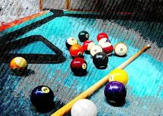 billiards and pool balls are sitting on the table