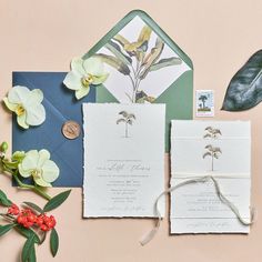 the wedding stationery is laid out and ready to be used