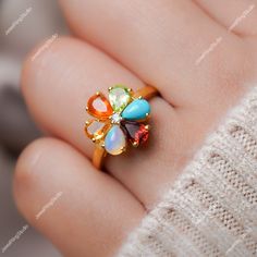 Gemstone : Natural Multi Gemstone (Garnet,Peridot,Turquoise,Fire Opal,Ethiopian Opal,Citrine) Metal : 14K White Gold / 14K Rose Gold / 14K Yellow Gold / 925S Silver Gemstone Shape and Size : Pear 6x4 MM Gemstone Weight : 2.80 Ctr Metal Weight :  3.30 Gram ACCEPT CUSTOM SERVICE 1. Accept change main stone type, size :  Pear 6x4 MM 2. Accept change other material : This jewelry can also be made in solid gold (14K white/rose/yellow gold...) Please contact me if you have special requests. Thanks for your visiting! Multicolor Gemstone Birthstone Ring For Wedding, Spiritual Multi-stone Birthstone Ring As Gift, Multicolor Multi-stone Cluster Ring As Gift, Spiritual Gemstones For Wedding, Oval Multi-stone Flower Ring Gift, Multicolor Multi-stone Birthstone Ring For Wedding, Multicolor Multi-stone Gemstones For Wedding, Multicolor Flower Ring As Gift, Wedding Multicolor Multi-stone Gemstones