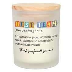 a candle with the words best team on it