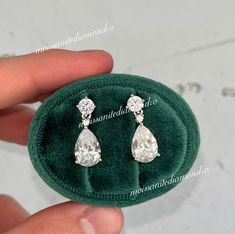 "Length : 0.8\" (2 cm) Main Stone Size: 1.2 cm X 0.8 cm (3 Carat / each) Main Stone Color: Clear White Main Stone Shape: Pear Cut Metal: Real Solid 925 Sterling Silver Hallmark: 925 Plating: Rhodium Plated Stones Setting: Prong Stones: High Quality Lab Moissanite Diamond Finish: High Polished Pear Dangle Drop Earrings 3 Carat Pear Cut Lab Moissanite Diamond 925 Sterling Silver Dangle Drop Wedding Earrings Gift Boxed For Her" Gift Drop Bridal Earrings With Prong Setting, Round Teardrop Cubic Zirconia Earrings For Anniversary, Anniversary Round Teardrop Earrings With Prong Setting, Gift Brilliant Cut Diamond White Teardrop Earrings, Dangle Bridal Earrings With Prong Setting As Gift, Dangle Bridal Earrings With Prong Setting, Diamond White Drop Bridal Earrings Gift, Silver Teardrop Diamond Cut Earrings Gift, Diamond White Drop Bridal Earrings