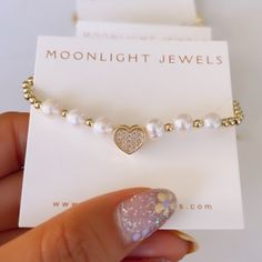 Details: 18k Gold Plated Copper Beads Pave Heart Approx. 6-8inches Adjustable Star And Moon Bracelet Sold Separately All Items Ship Within 1-2 Business Days. #Jewelry #18kgold #Bracelets #Beadedjewelry #Sterlingsilver Elegant Pearl Bracelet With Heart Beads For Mother's Day, Dainty White Heart Bracelet For Anniversary, Pearl Jewelry With Heart Beads For Mother's Day, Pearl Heart Beads Jewelry For Mother's Day, Mother's Day Pearl Jewelry With Heart Beads, Gold Beaded Dainty Heart Bracelet, Elegant Beaded Heart Bracelet For Valentine's Day, Pearl Beaded Bracelets With Heart Beads, Dainty Gold Beaded Heart Bracelet