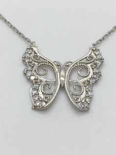 925 Sterling Silver Large Butterfly Necklace With Zirconia Stones Material : 925 Sterling Silver Pendant lenght : 20 mm Necklace Weight: 2.0 gr. Length: 40 cm +3 cm extender All our silver jewellery comes with jewellery boxes have a feature that  does not tarnish. Polished solid silver. Keep it clean with a non-tarnishing cloth. 925 Sterling Silver Buttetfly Necklace With Zirconia Stones/ Stylish Jewellery / Women Gift / Women Necklace / Christmas Gift/ New in Engraved Sterling Silver Necklace In Diamond White, Sterling Silver Engraved Diamond Necklace, White Sterling Silver Diamond Necklace, Engraved Sterling Silver Diamond Necklace, Engraved Sterling Silver Fine Jewelry Diamond Necklace, Silver Diamond Engraved Necklace, Engraved Diamond Silver Necklace, Silver Diamond Pendant Necklace Engraved, Sterling Silver Jewelry With Diamond Cut In Silver